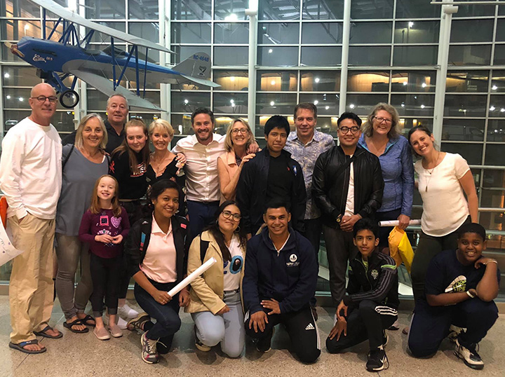 The new students and their homestay families at the airport in Seattle