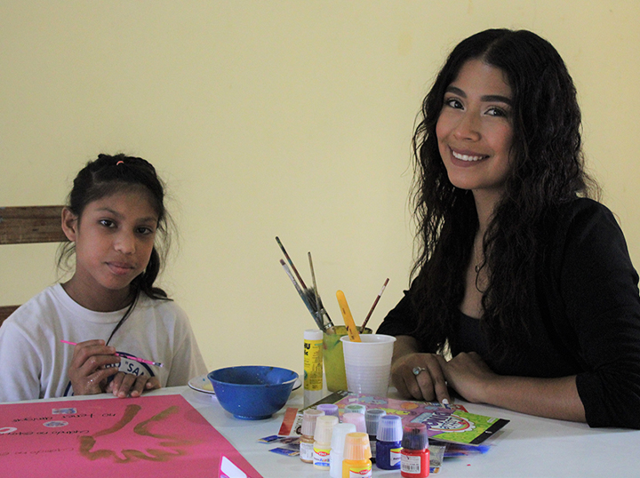 Ana and a child at NPH Honduras.